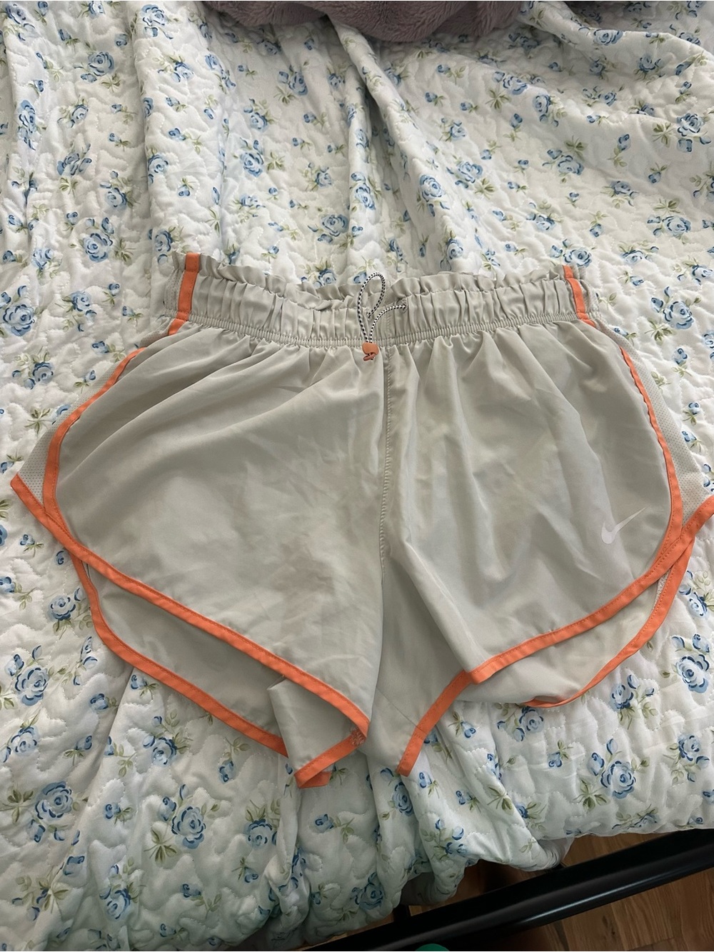 Nike Women’s Light Gray Athletic Shorts with Orange Trim